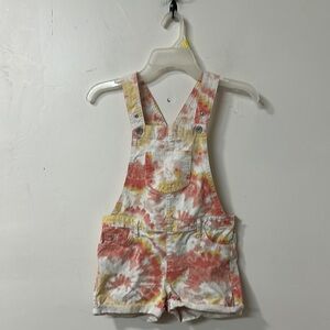 Place pink and Yellow Overalls Floral Bib Style